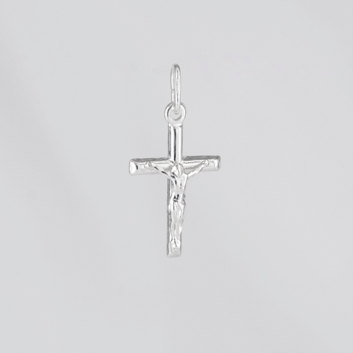 DIJE CRUZ CRISTO TUBULAR PEQUEÑA